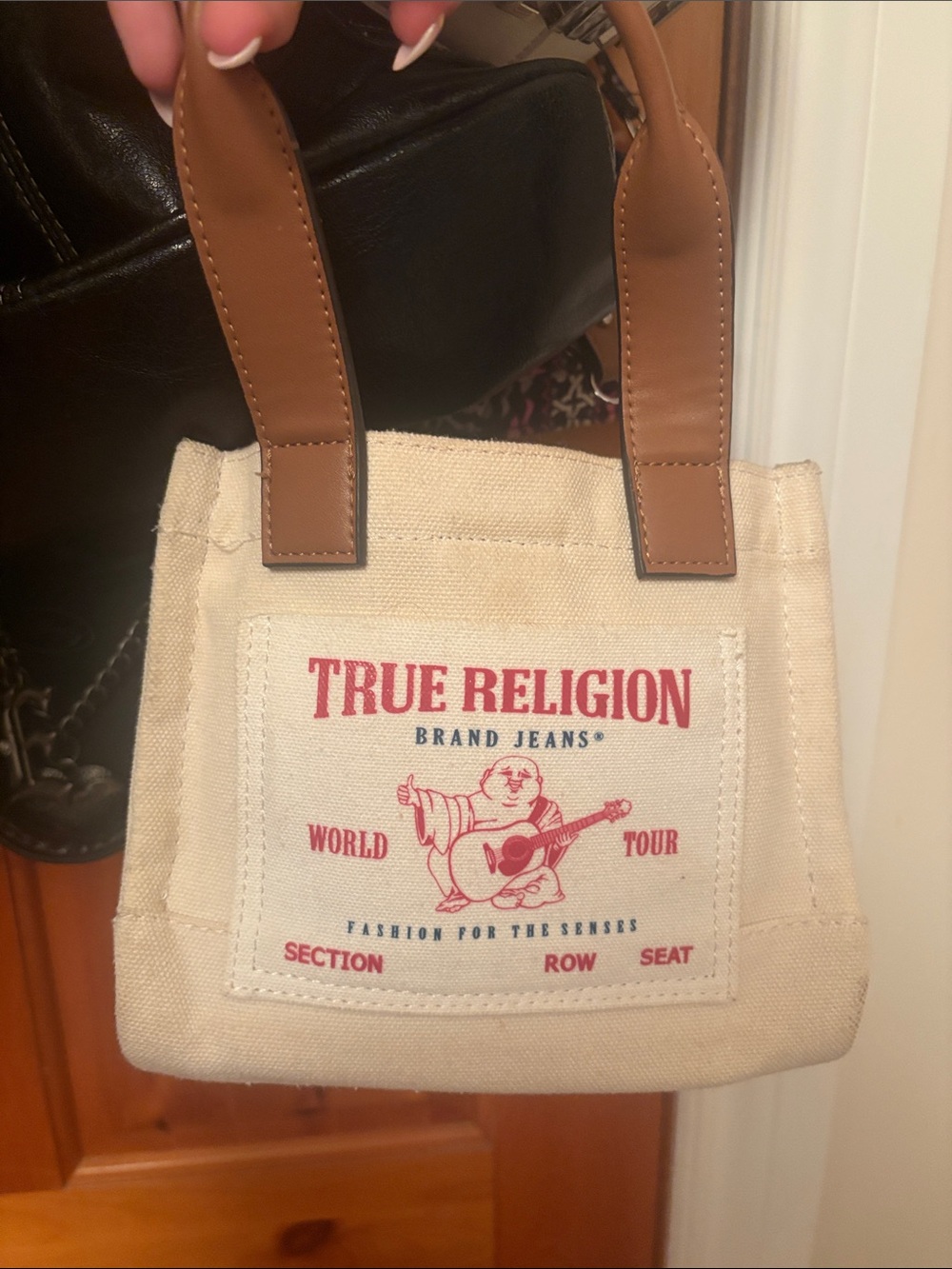 True Religion Cream Canvas Mini Tote with Brown Handles and Red Logo